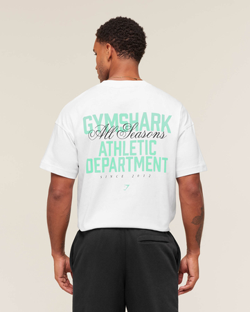 تيشيرت بقصة فضفاضة ونقشة أثليتيك ديبارتمنت غرافيكية