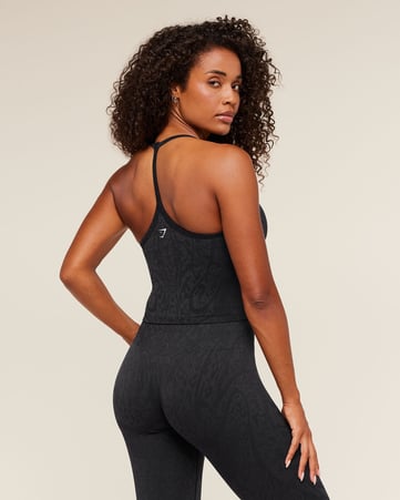 بلوزة أدابت بلا أكمام بطبقة داخلية ونقشة جلد فه