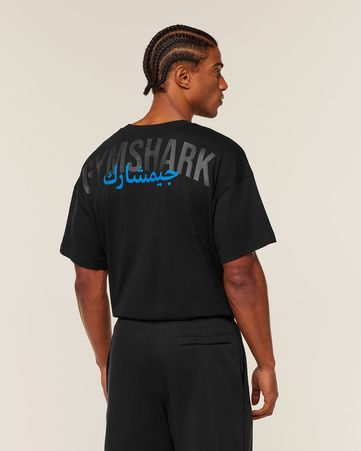 تيشيرت باور أوفرلاي بقصة فضفاضة ونقشة غرافيكية