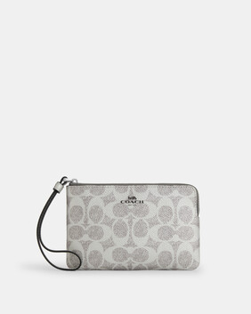 محفظة بسوار معصم وسحاب جانبي قماش قنب مزين بشعار الماركة