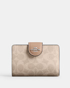 Medium Corner Zip Wallet In Signature Canvas