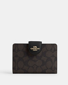 Medium Corner Zip Wallet In Signature Canvas