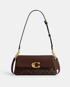 Jet Shoulder Bag In Signature Canvas