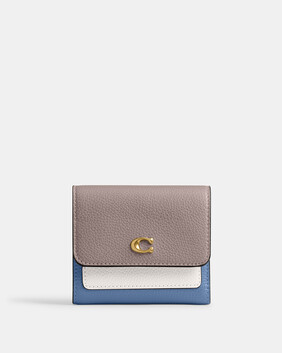 محفظة ميلا صغيرة بغطاء قلاب وتصميم مقسم بألوان