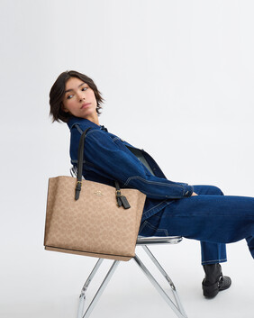 حقيبة يد مولي قماش قنب مغلف بشعار الماركة